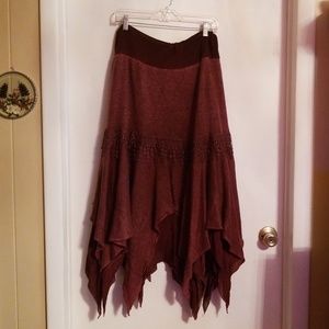 Skirt waist from 35 - 41 length shortest point 31